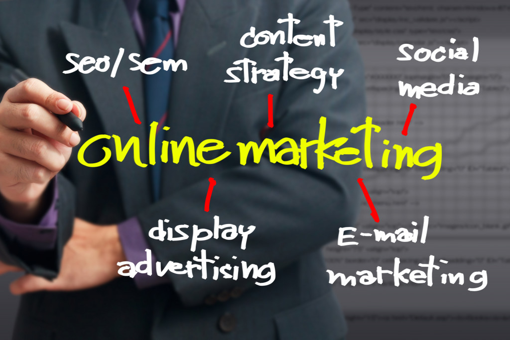 online marketing concept being written by businessman